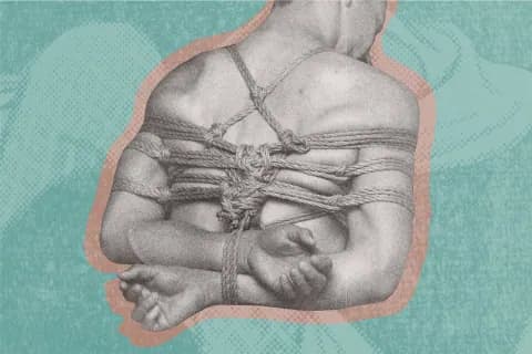 a man with hands bound behind back with a shibari takate kote (TK), set against a teal background.