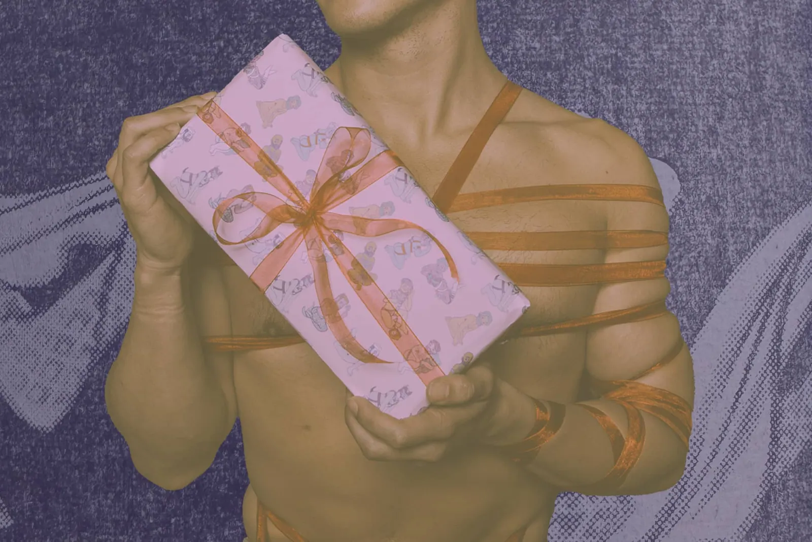 man tied in rope holding a present with a red bow.