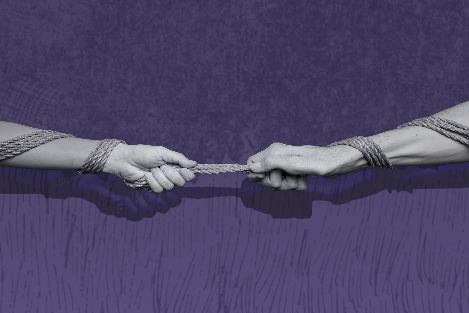 Two hands bound with rope pulling in opposite directions against a purple background