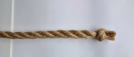 Natural jute rope with a finished stopper knot at the end.