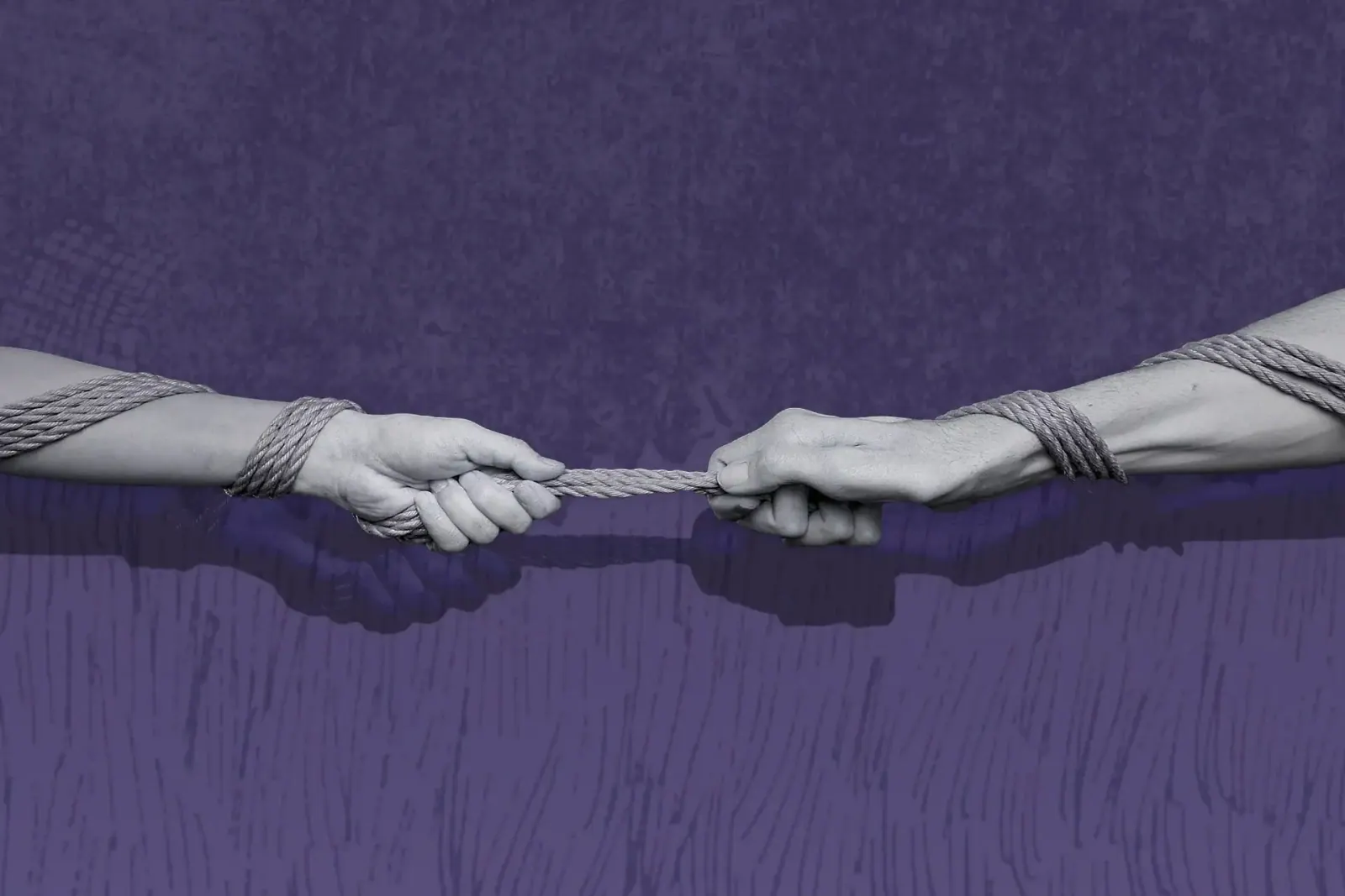 Two hands are connected by shibari rope against a purple background.
