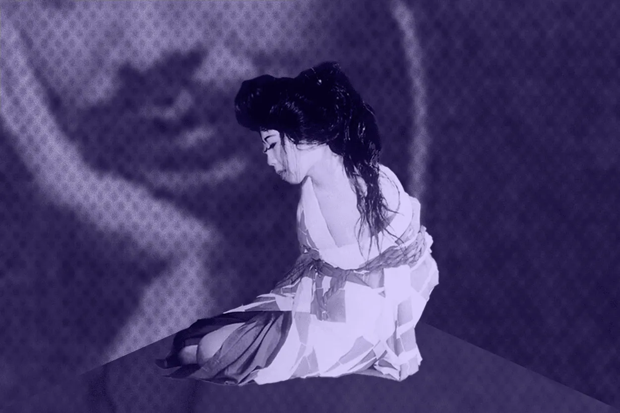 A woman in a kimono, bound in shibari, kneels with her head bowed in a stylized, purple-toned image.
