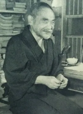 Vintage photograph showing detailed rope work on a bound person.